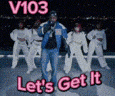 a man singing into a microphone with the words let 's get it behind him