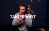 a man wearing headphones is smoking a cigarette and the words take-profit are above him