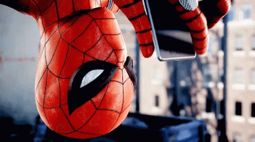 Spiderman Texting GIF - Spiderman Texting Upside Down GIFs