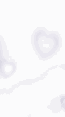 a blurred image of a white background with a purple gradient .