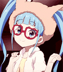 a girl with blue hair wearing glasses and a hat