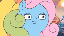 a cartoon drawing of a pony with rainbow hair
