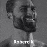 a black and white photo of a shirtless man with the word robercik on the bottom right