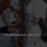 a man and a woman are sitting next to each other with a quote in the corner