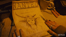 Wanted Poster Sweet Tooth GIF - Wanted Poster Sweet Tooth Picking Up The Poster GIFs