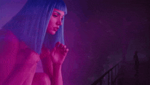 a woman with blue hair and the words jij gaat fio on the bottom