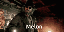 a man in a hat and sunglasses is standing in a dark room with the word melon written on the bottom .