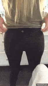 a woman 's butt is shown in a makeagif.com video