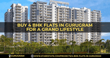 a large building with the words buy 4 bhk flats in gurugram for a grand lifestyle on it