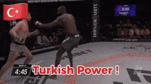 two men are fighting in a ring with the words turkish power