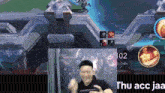a man is playing a video game with the number 02 in the corner