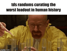 a man in a yellow jacket is holding a pipette and a beaker of liquid ..