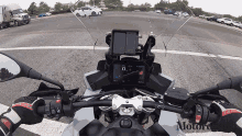 Pointing Motorcyclist Magazine GIF - Pointing Motorcyclist Magazine Check This Out GIFs