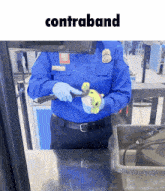 a security guard is holding a stuffed animal and the word contraband is on the bottom