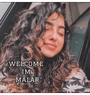 a woman with curly hair is smiling with the words welcome im malar on the bottom
