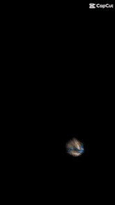a blurry picture of a person with a capcut watermark