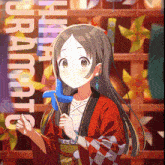 a girl in a kimono is holding a blue windmill in front of a sign that says uramatsu