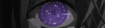a close up of a person 's eye with a purple iris and a black background .