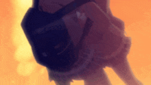 a blurry picture of a person with a backpack on