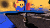 a person is standing in front of a bunch of boxes with faces