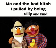 bert and ernie from sesame street are standing next to each other holding a yellow duck