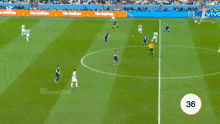 a soccer game is being played on a field with advertisements for vivo