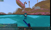 a screenshot of a video game shows a candy cane tower and a candy cane bridge