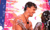 a man and a woman covered in soap bubbles