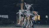 a blurred image of a person in a red white and blue costume with the word redbull on it