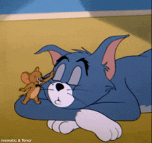 a cartoon of tom and jerry laying on the floor with the caption memetic & tenor