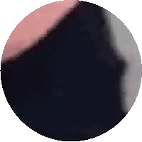 a close up of a black circle with a white border on a white background
