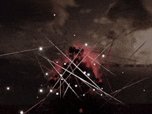 a dark background with a lot of lines and dots