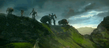 a group of robots and animals are standing on top of a hill