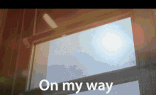 a picture of a window with the words on my way above it