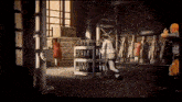 a man is pushing a cart in a warehouse filled with lots of weapons .