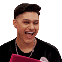 a man wearing a chain around his neck is laughing with his mouth open