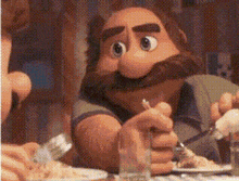 a cartoon character with a mustache is sitting at a table with a plate of food .