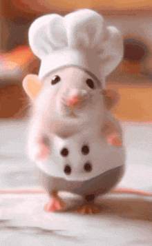 a rat wearing a chef 's hat and apron