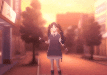 a girl in a blue dress is standing on a street in front of a sign that says " tokyo "
