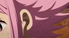 a close up of a person 's ear and eye