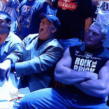 Brock Lesnar Paul Heyman GIF - Brock Lesnar Paul Heyman Laugh GIFs