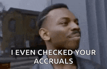 a man is making a funny face and saying `` i even checked your accruals ''