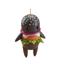 a figurine of a hamburger with sesame seeds on top