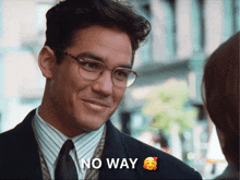a man wearing glasses and a suit has the words no way written on his face