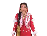 a woman in a red and white dress has the number 3 on her jacket