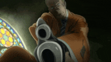 a man in a suit and tie is pointing a gun