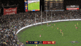 a soccer game is being played in a stadium with a banner for hilux hill in the background