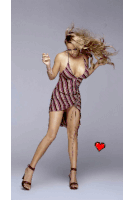 a woman in a very short dress is dancing