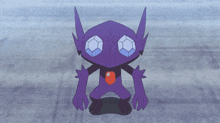 a purple monster with sharp teeth and a blue eye