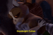 a cartoon fox laying down with the words goodnight cuties below it